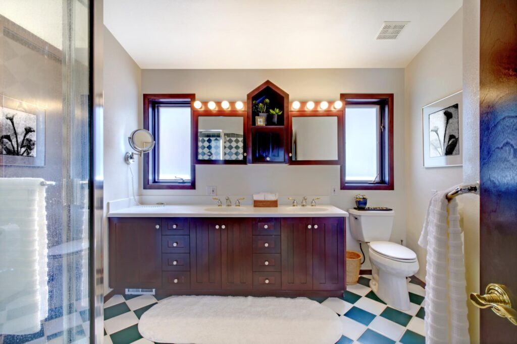 bathroom with white and green flooring tiles